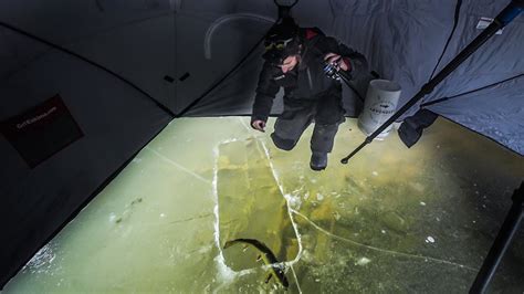 Ice Fishing by Feel or Sight .